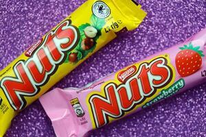 KYIV, UKRAINE - MAY 4, 2022 Nuts original chocolate bar manufactured by Nestle company photo