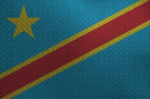 Democratic Republic of the Congo flag depicted in paint colors on old brushed metal plate or wall closeup. Textured banner on rough background photo