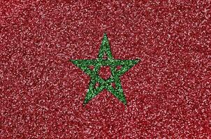 Morocco flag depicted on many small shiny sequins. Colorful festival background for party photo