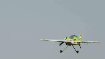 Retro plane flies at airshow. Twoseat sports trainer aircraft, designed for initial training and training of pilots. Soviet plane Yakovlev video