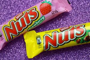 KYIV, UKRAINE - MAY 4, 2022 Nuts original chocolate bar manufactured by Nestle company photo