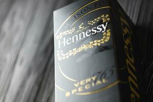 KYIV, UKRAINE - MAY 4, 2022 Hennessy Very Special original alcohol bottle on black wooden table photo