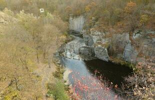 Granite rocks of Bukski Canyon with the Girskyi Tikych River. Picturesque landscape and beautiful place in Ukraine photo