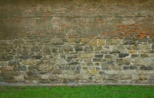 Large stone wall of an ancient castle in Lviv, Ukraine photo