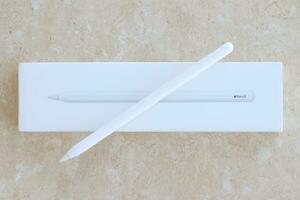 KYIV, UKRAINE - 4 MAY, 2023 New Apple pencil generation 2. Features a flat edge that attaches magnetically for automatic charging and pairing photo