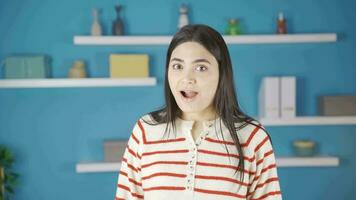 Happy young woman with braces looking at camera. video