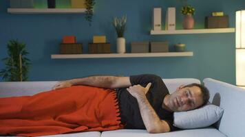 Man In Bed Laughing At Camera. video