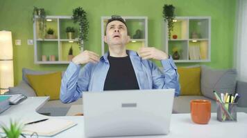 Man working at home office experiences shortness of breath. Respiratory Failure. video