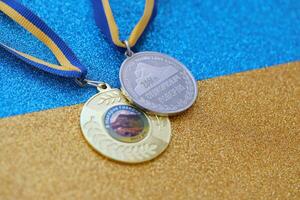 KYIV, UKRAINE - MAY 4, 2022 Medal for the person who conquered Mount Hoverla photo