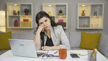 Home office worker woman making negative gesture at camera. video