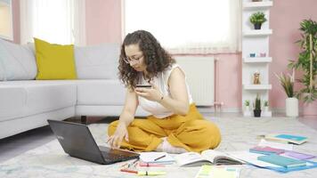 Female student doing e-commerce shopping. video