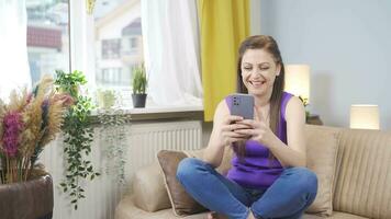 Happy and happy texting woman. video