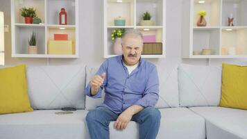 The old man who is disgusted with something. video