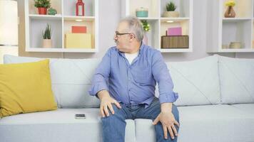 The old man waiting helplessly at home. No one is coming and he is alone. video