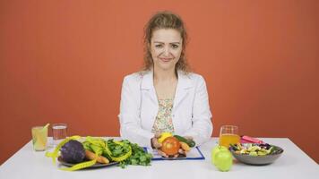 Dietitian doctor holding vegetables. Healthy life message. video