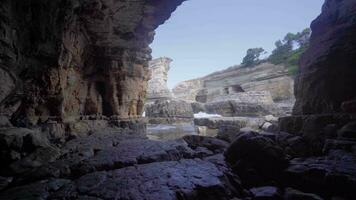 Sea cave formed on the seashore. video