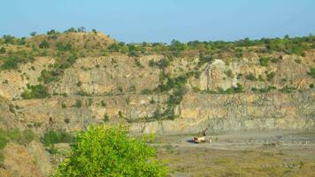 Mountain granite quarry with old equipment. video