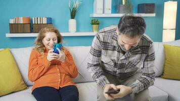 Miscommunication between husband and wife. Phone addiction. video