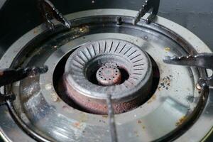 A gas stove that begins to rust due to heavy use without maintenance. photo