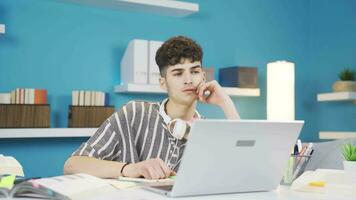 The thinking student is upset and stressed by what he remembers. Negative expression. video