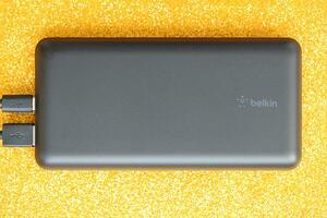 KYIV, UKRAINE - MAY 4, 2022 Portable Powerbank battery with logo of Belkin International photo