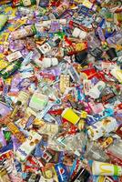KHARKOV, UKRAINE - AUGUST 10, 2021 Big pile of various wrappings and empty disposable packages and cups from famous branded food production photo