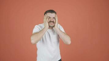 Man having a nervous breakdown in front of the camera. video