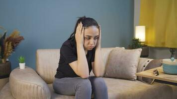 Desperate woman with her hands on her head. Depressed. video