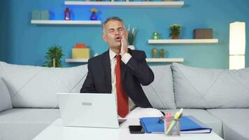 Home office worker man teeth aches and pains. video
