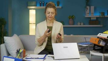 Home office worker sprays perfume on woman. video