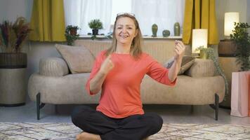 Woman doing rocker sign and dancing. video