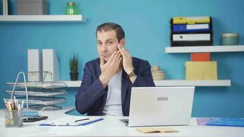 Businessman looking at his wrinkled and rough skin. video