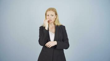 Stressed business woman biting nails. video