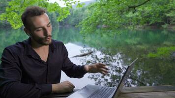 Businessman having remote live meeting. video