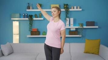 Woman doing arm exercises at home. Fitness, sport. video