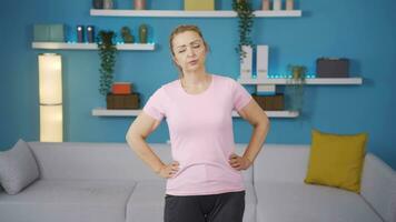 The woman exercising at home. video