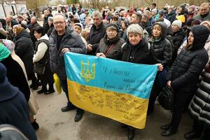 TERNOPIL, UKRAINE - APRIL 2, 2023 People with flag during mission in complex of Ukrainian Jerusalem in the Mari spiritual center of Zarvanytsia In the Terebovlya district of the Ternopil photo