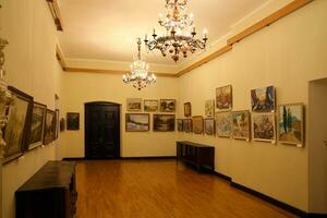 TERNOPIL, UKRAINE - AUGUST 23, 2023 Interior of one of the rooms of the Zbarazh Castle, fortified defense stronghold in Zbarazh town photo