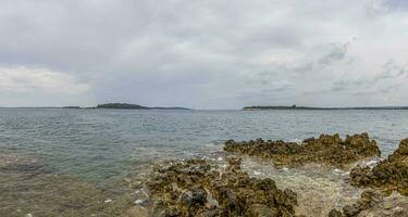 Picture of a deserted section of the Istrian Adriatic coast in summer photo