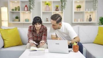 Married couple engaged in home economics. video