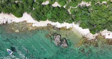 Vertical drone video over a stretch of coast near the town of Pula in Istria