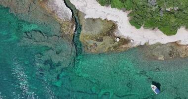 Vertical drone video over a stretch of coast near the town of Pula in Istria