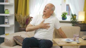 Sick man with rapid breathing. The man cannot control his breathing. video