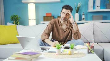 The pensive and unsuccessful young man is bored. video