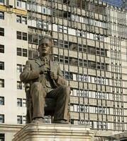 Skopje, North Macedonia - September 20, 2023 - Statue of Pavel Potsev Satev, Macedonian-Bulgarian revolutionary, with an unfinished building in the background. photo