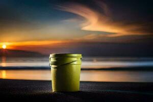 a green bucket on the beach at sunset. AI-Generated photo