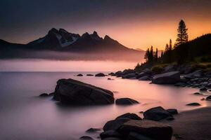 un hermosa amanecer terminado un lago con rocas y arboles generado por ai foto