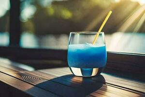 azul bebida en un vaso en un de madera mesa. generado por ai foto