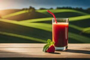 a glass of juice with strawberries on a table in front of a green field. AI-Generated photo