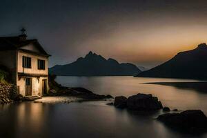 a house sits on the shore of a lake at dusk. AI-Generated photo